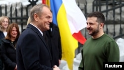Ukrainian President Volodymyr Zelenskiy meets with Polish Prime Minister Donald Tusk, amid Russia's attack on Ukraine, in Kyiv, Ukraine Jan. 22, 2024. 