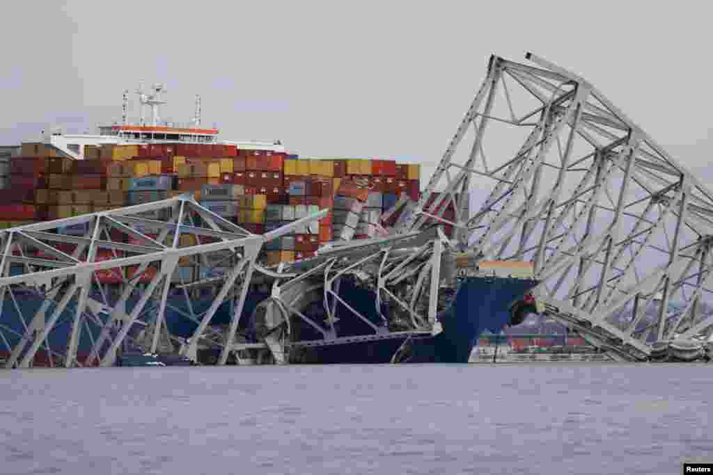 A view of the Dali cargo vessel which crashed into the Francis Scott Key Bridge causing it to collapse in Baltimore, Maryland. A massive freight ship stacked high with containers smashed into the bridge while sailing out of Baltimore, sending cars and people into the Patapsco River below and closing one of the busiest ports on the U.S. Eastern Seaboard.