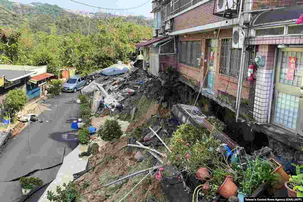 This photo taken by Taiwan's Central News Agency (CNA) on April 3, 2024 shows damage to buildings in Xindian district of New Taipei City, after a major earthquake hit Taiwan's east.