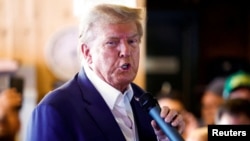 Donald Trump en campagne à l'Iowa State Fair à Des Moines, dans l'Iowa en août 2023.