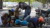 Waiting for change, Haitians endure hell on Earth 