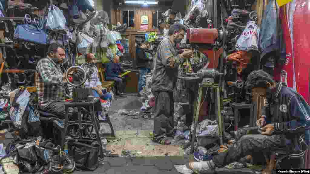 For shoemaker Abu Yasser, business is slow this year, even though he’s been offering his handcrafted footwear for about half the price of other shops. “My customers are even bargaining down the cost of shoe repairs,” he says.