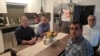 Joseph Poliszuk, Roberto Deniz, Alfredo Meza y Ewald Scharfenberg, periodista de Armando.Info, posan luego de salir exiliados rumbo a Miami en 2018. [Foto: Cortesía]