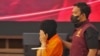 ASD, salah satu tersangka TPPO WNI ke Myanmar digiring Petugas Bareskrim Polri menuju konferensi pers pada Selasa (16/5) di Mabes Polri, Jakarta.