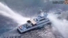 Philippine, Chinese coast guard vessels involved in new confrontation in South China Sea 