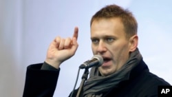 FILE - Alexey Navalny speaks at a rally in Moscow, Dec. 24, 2011.