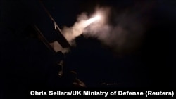 HMS Richmond, protecting merchant shipping in the Red Sea from Houthi rebel attacks, fires missiles to shoot down hostile Houthi drones heading toward the ship on the Red Sea, March 9, 2024. (Chris Sellars/UK Ministry Of Defense/Handout via Reuters)