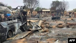 FILE - This picture taken on Sept. 1, 2023, shows a view of destruction in a livestock market area in al-Fasher, the capital of Sudan's North Darfur state. 