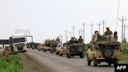 Sejumlah pasukan militer melakukan konvoi di Kota Gedaref, Sudan, di mana mereka bergerak menuju wilayah Pelabuhan Sudan, pada 30 Agustus 2023. (Foto: AFP)