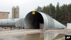 FILE - This May 8, 2014, photo shows the opening to the Eagle Mine in western Marquette County, Michigan. (AP Photo/John Flesher)
