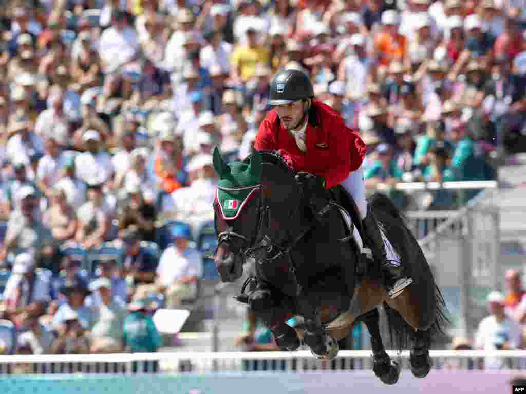 Mexico's Andres Azcarraga with horse Contendros 2 competes in the equestrian's jumping individual qualifier during the Paris 2024 Olympic Games at the Chateau de Versailles, in Versailles, in the western outskirts of Paris.