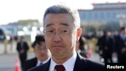中共前領導人胡錦濤之子、時任浙江麗水市委書記胡海峰前往北京人大會堂出席全國人大會議閉幕式。（2019年3月15日）
