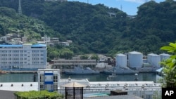 FILE - Taiwan military vessels are seen in Keelung Harbor in Taiwan, Aug. 4, 2022. Taiwan's defense ministry said it detected three balloons from China flying over the Taiwan Strait on Jan. 8, 2024, the latest in a spate of such sightings.