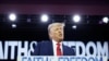 Mantan presiden AS, Donald Trump, berpidato dalam konferensi "Road to Majority" yang digelar Koalisi Keyakinan dan Kebebasan 2023, Washington, 24 Juni 2023. (Foto: Tasos Katopodis/Reuters)