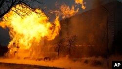 Fire and smoke rises after a Russian attack in Kyiv, Ukraine, Jan. 2, 2024. 