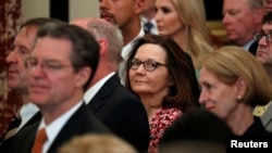 U.S. Central Intelligence Agency director nominee Gina Haspel center, attends Secretary of State Mike Pompeo's ceremonial swearing-in at the State Department in Washington, May 2, 2018.