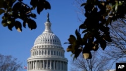 Sunlight shines on the U.S. Capitol dome on Capitol Hill in Washington, Feb. 21, 2022.