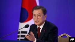 South Korean President Moon Jae-in speaks during his New Year press conference at the presidential Blue House in Seoul, South Korea, Tuesday, Jan. 14, 2020. (Kim Hong-Ji/Pool Photo via AP)