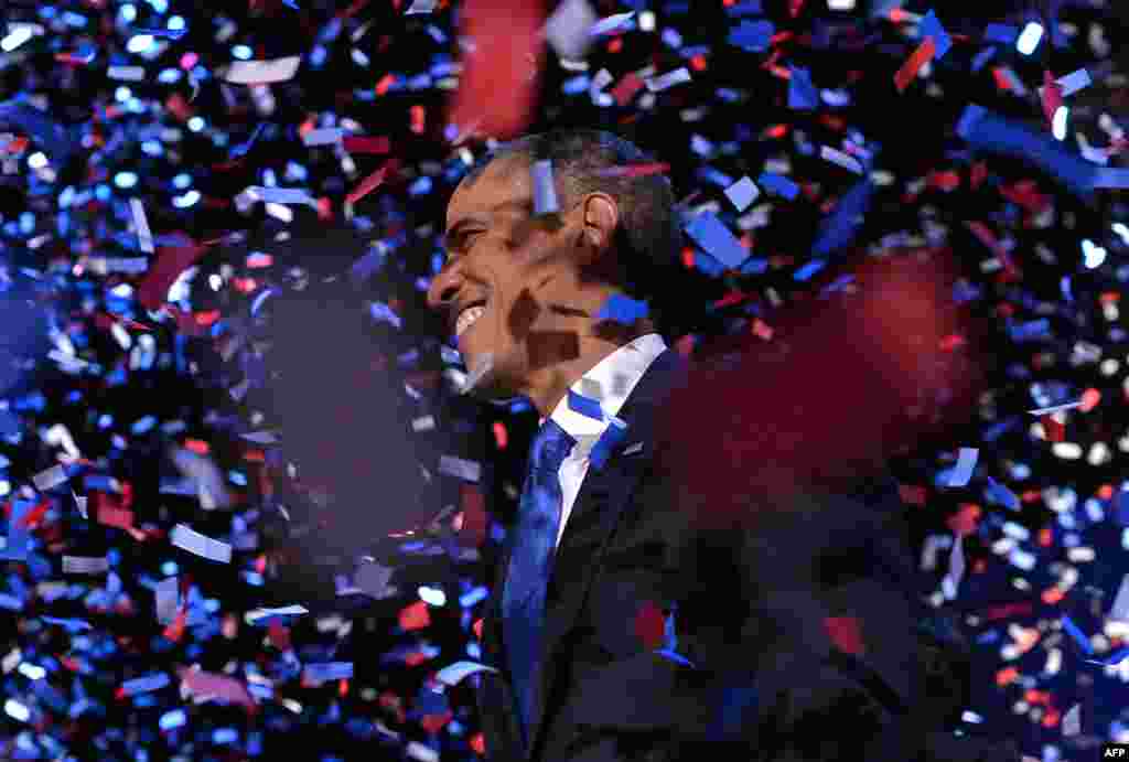 US President Barack Obama celebrates after delivering his acceptance speech in Chicago on November 7, 2012.