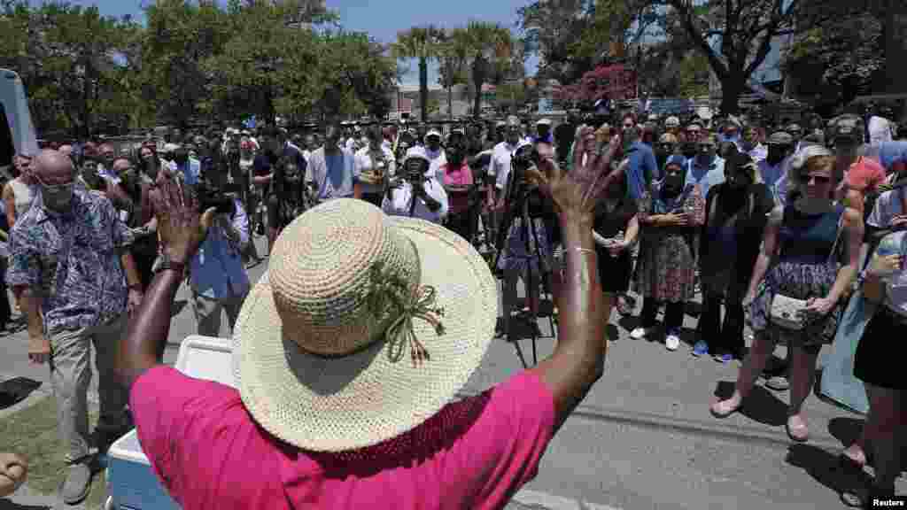Sandra Barbour reacts outside Morris Brown AME Church before attending a vigil the day after a mass shooting in Charleston, South Carolina, June 18, 2015.
