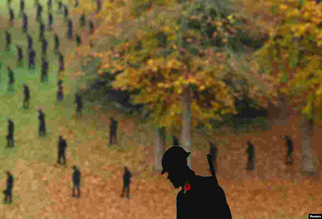 A view of 'For Your Tomorrow', an art installation of 1,475 silhouettes of World War II military personnel as a memorial to the soldiers killed in the 1944 D-Day landings 80 years ago, ahead of this year's Remembrance commemorations, at Stowe Gardens, in Stowe, Britain.