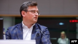 FILE - Ukraine Foreign Minister Dmytro Kuleba sits at EU headquarters in Brussels on May 16, 2022. On Tuesday he urged other governments to send weapons to aid Ukraine’s fight against Russian forces.