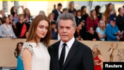 File - Actor Ray Liotta and a guest arrive at the 22nd Screen Actors Guild Awards in Los Angeles, California January 30, 2016.