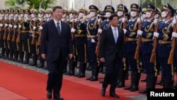 中国国家主席习近平2023年1月4日为到访的菲律宾总统小马科斯举行欢迎仪式。（路透社转发）