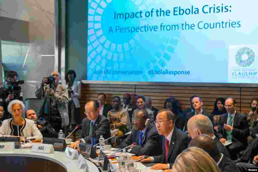 (Left to right at table) IMF Managing Director Christine Lagarde, World Bank Group President Jim Yong Kim, Guinea's President Alpha Conde and United Nations Secretary-General Ban Ki-moon address the Ebola crisis during the IMF-World Bank annual meetings in Washington, Oct. 9, 2014.