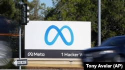 Facebook parent Meta unveiled a high-end virtual reality headset Tuesday, Oct. 12, 2022, (AP Photo/Tony Avelar, File)
