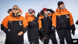New Zealand Prime Minister Jacinda Ardern, second right, is seen shortly after stepping off the plane in Antarctica, Oct. 26, 2022.