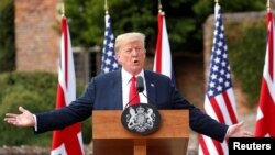 U.S. President Donald Trump speaks as he and British Prime Minister Theresa May hold a press conference after their meeting at Chequers in Buckinghamshire, Britain July 13, 2018.