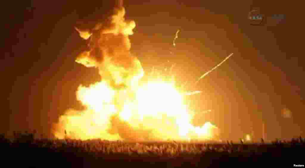An unmanned Antares rocket is seen exploding seconds after lift off from a commercial launch pad in this still image from NASA video at Wallops Island, Virginia, Oct. 28, 2014.