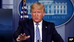 President Donald Trump speaks about the coronavirus in the James Brady Briefing Room, Monday, March 23, 2020, in Washington. (AP Photo/Alex Brandon)
