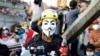 Tens of Thousands of Iraqis Turn Out for Largest Day of Protests
