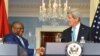 Georges Chicoty, ministro dos Negócios Estrangeiros angolano com John Kerry, secretário de Estado dos Estados Unidos em Washington 