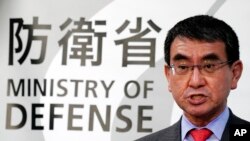 FILE - Japanese Defense Minister Taro Kono speaks during a press conference at his ministry's headquarters in Tokyo, Jan. 10, 2020. 