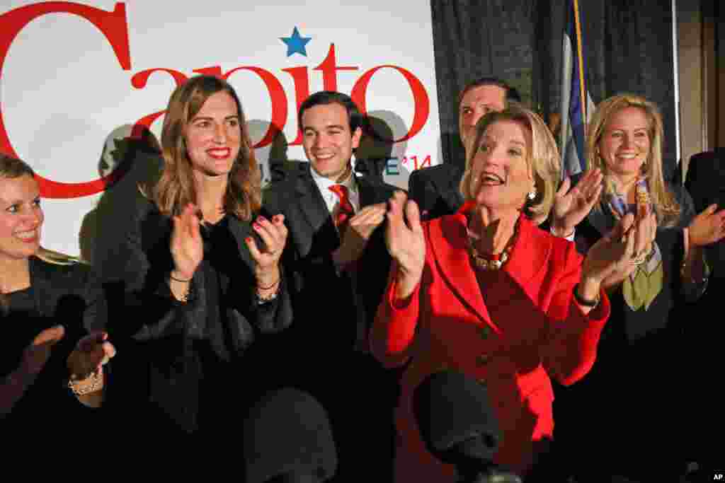 West Virginia Republican Rep. Shelley Moore Capito applauds at a party in Charleston after winning a U.S. Senate seat, Nov. 4, 2014.