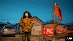 A cluster of COVID-19 coronavirus cases in China's northeastern city of Harbin has forced officials to tighten restrictions on movement on April 22 to try to prevent a second outbreak.