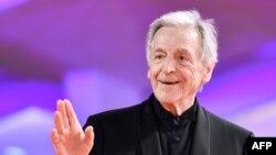 French Greek director Costa-Gavras arrives for the screening of the film "Adults in the Room" presented out of competition, and to the JLC Glory To The Filmmaker Award during the 76th Venice Film Festival at Venice Lido, Italy, Aug. 31, 2019.