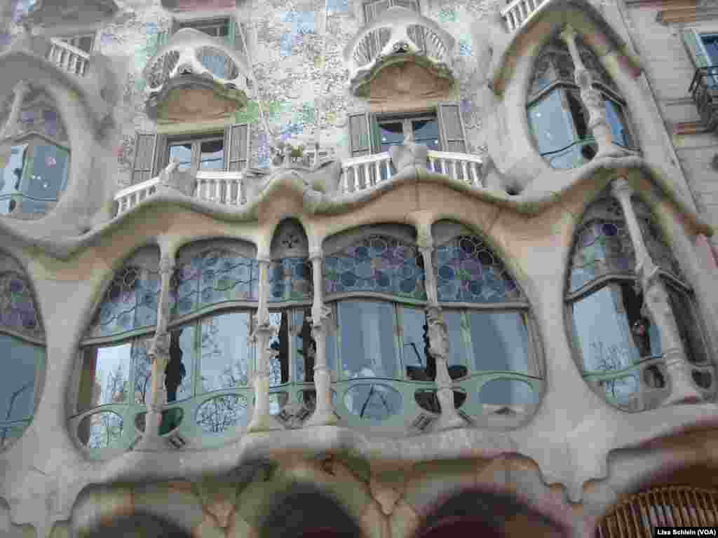 A close-up view of Casa Batllo's facade, which shows its skeletal quality, which has led locals to refer to the structure as House of Bones, in Barcelona.