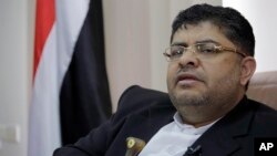 The head of the revolutionary committee of Yemen's Shiite Houthi rebels, Mohammed Ali al-Houthi speaks to a reporter during an interview with Associated Press in Sanaa, Yemen, March 19, 2019. 