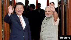 中国国家主席习近平和印度总理莫迪2014年9月17日在印度艾哈迈达巴德举行会谈