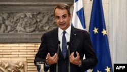 FILE - Greek Prime Minister Kyriakos Mitsotakis in Athens on Aug. 25, 2023. Mitsotakis said new identification cards will not contain “any chips or cameras or listening devices.”