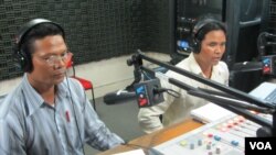 Hello VOA's guests: Ouch Leng (right) and Chan Thy (left) said how hey have been forced to take forest protection into their hands.