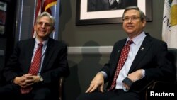 U.S. Senator Mark Kirk, an Illinois Republican, meets with President Barack Obama's Supreme Court nominee Merrick Garland, at left, on Capitol Hill in Washington, March 29, 2016.