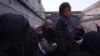Lull in Fighting Lets Islamic State Families Flee, Fighters Surrender