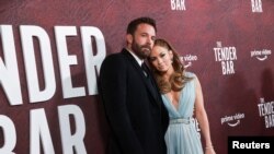 FILE - Ben Affleck and Jennifer Lopez in Los Angeles, California, U.S., December 12, 2021.
