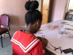 Women rescued from prostitution make jewelry from bullet casings at Ethiopian social enterprise Ellilta Products in Addis Ababa, Oct. 22, 2019.