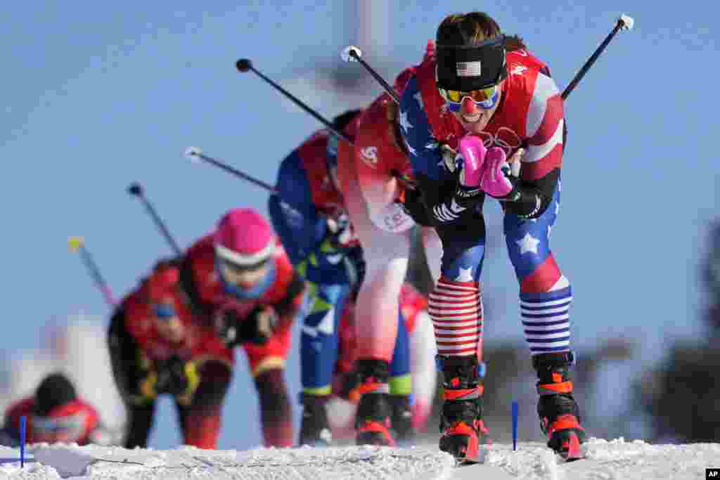 Rosie Brennan of the U.S. leads a group during the women's team sprint classic cross-country skiing competition at the 2022 Winter Olympics in Zhangjiakou, China.